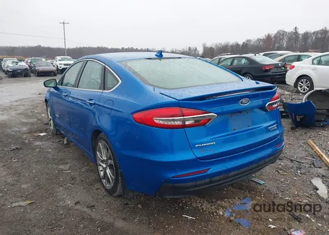 2019 Ford Fusion Hybrid Titanium from USA, damaged, VIN 3FA6P0RU1KR266955